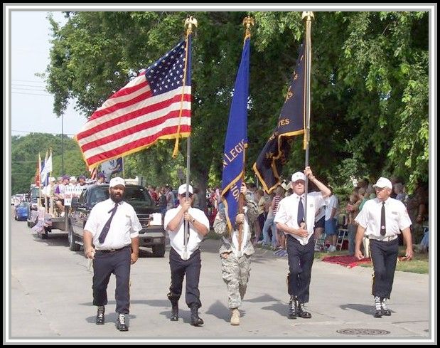 photograph of Gene marching in the Honor Guard parade on 04 July, 2007