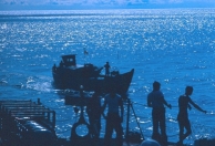 photograph showing crewmembers looking for?
