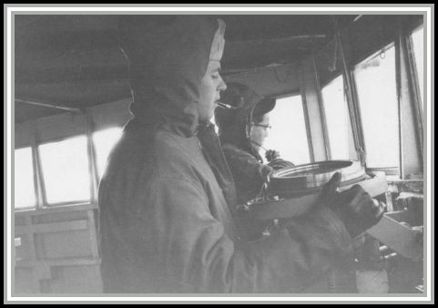 photograph of Lt. Ed Hamilton on the bridge