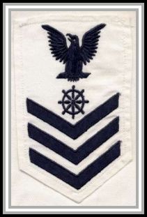 scan of QM1c insignia, summer whites