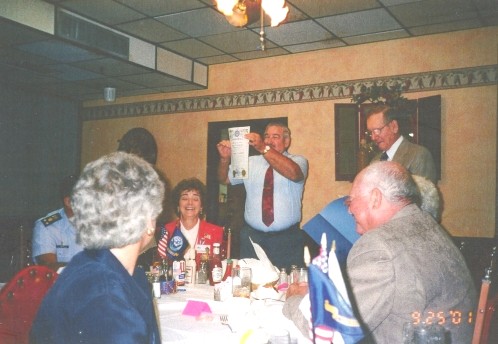 photograph of Ray displaying his certificate