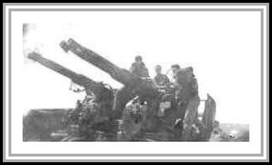 photograph showing manned 40 mm anti-aircraft guns (crewmembers unknown)