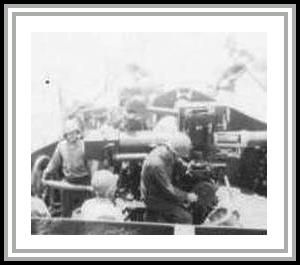 photograph showing manned 40 mm anti-aircraft guns (crewmembers unknown)