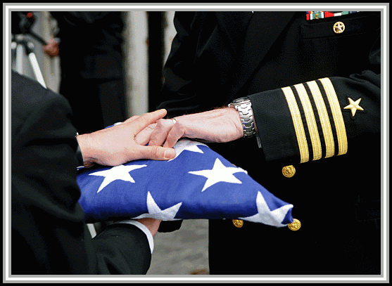 photograph of flag being presented to family member