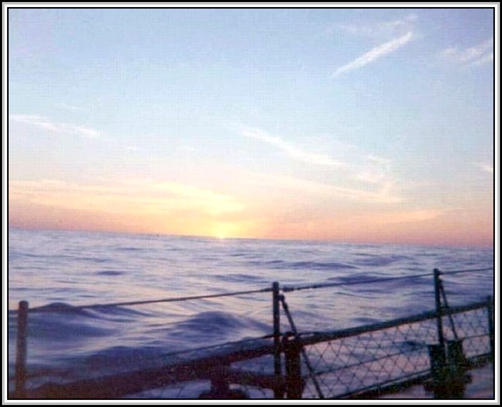 photograph of sunset taken aboard the USS Savage
